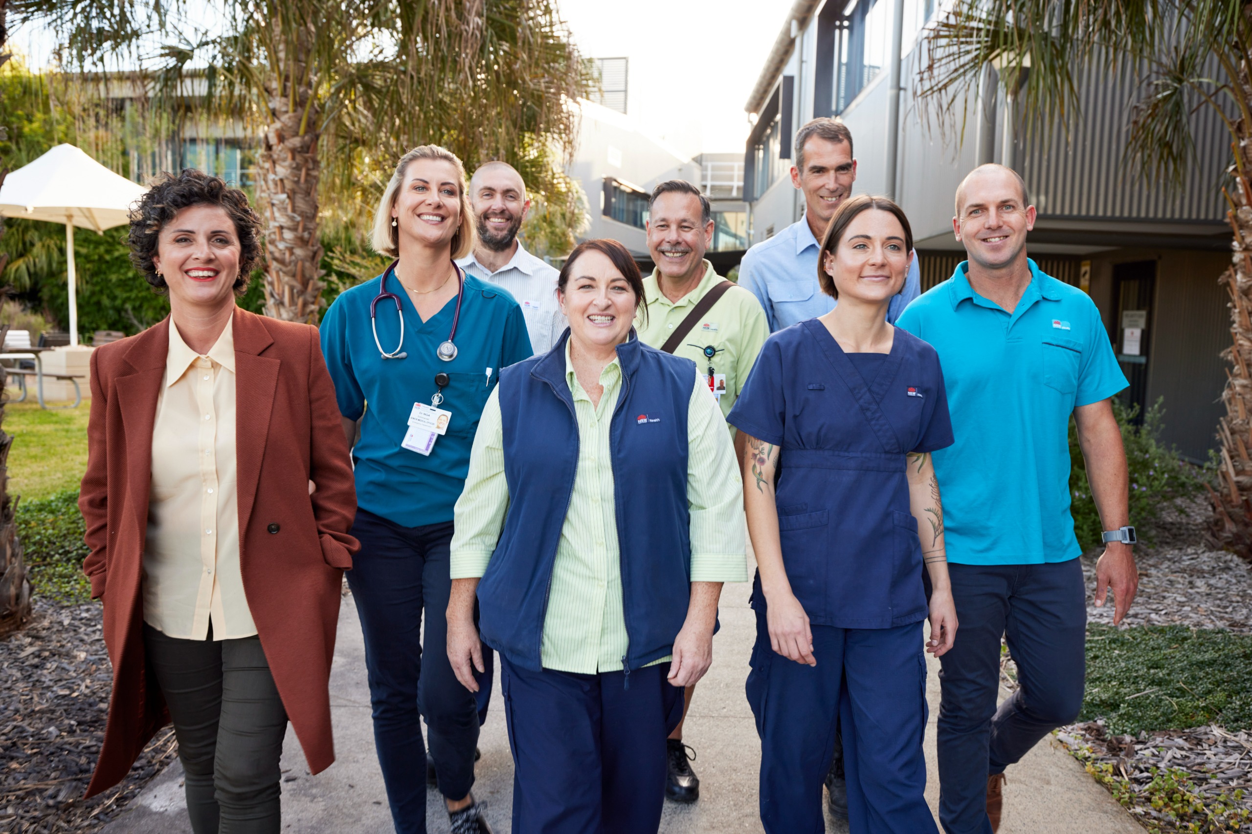 Group of medical staff walking.